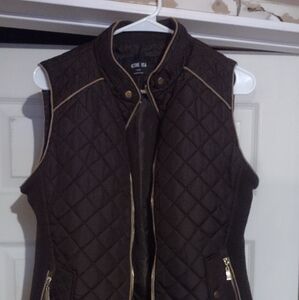 Woman's Active U.S.A brown quilted zip up vest size large Demensions are 18"x22"